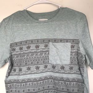 Teal On The Byas Turtle Print Tee.